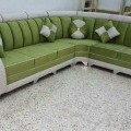 Designer corner sofa with pillows