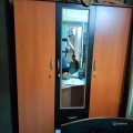 Just 3 years ... Beautiful Durain Brand 3 Door wardrobe with mirror and sitting setti with cushion..has multiple hanger rods , Dressing table,, spacious,well built