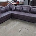 Grey lounger sofa with pillows