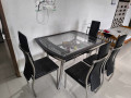 Dining table with glass top