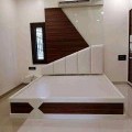 wooden bed without mattress